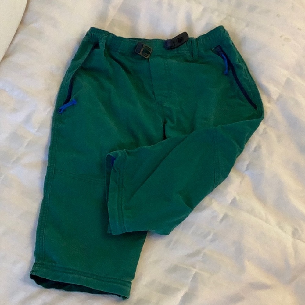 Durable boys pants in true green with cobalt blue accents.